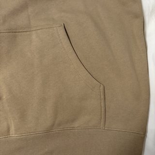 Close up of the hoodie pocket and side stitching